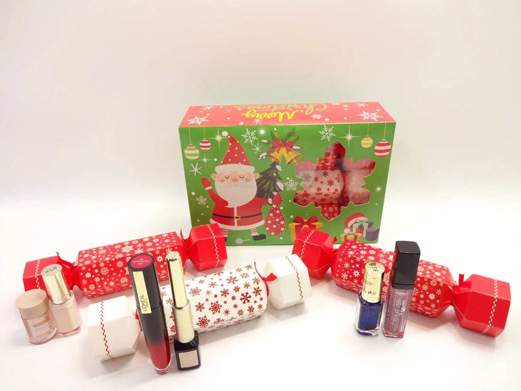 Assorted L’Oreal cosmetics including lip, eye, and nail products in Christmas cracker gift packaging