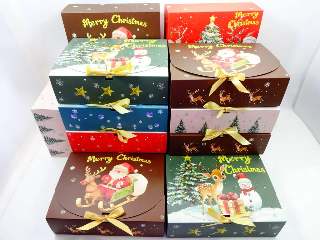 Set of Christmas-themed gift boxes with festive designs on a white background
