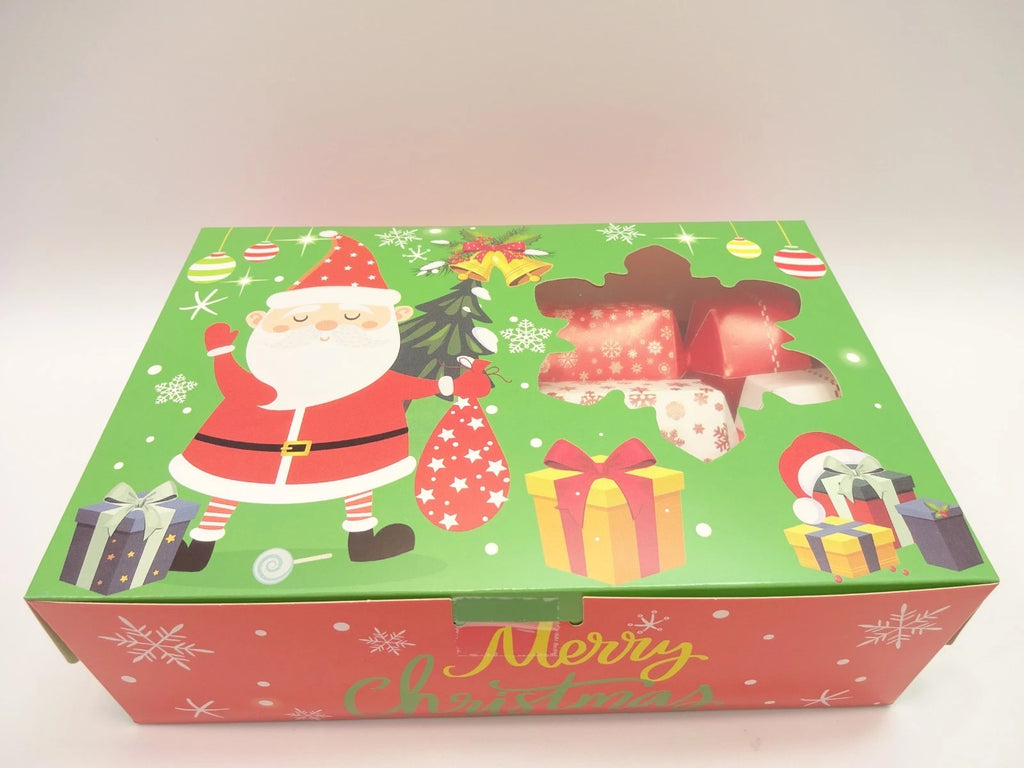 Closed L’Oreal Christmas cracker gift box with Santa and present illustrations