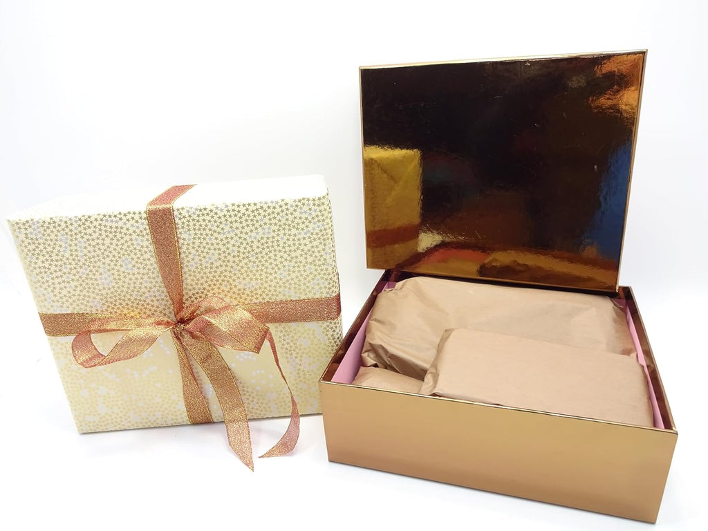 Golden Fathers Day gift box opened to reveal brown tissue-wrapped products inside
