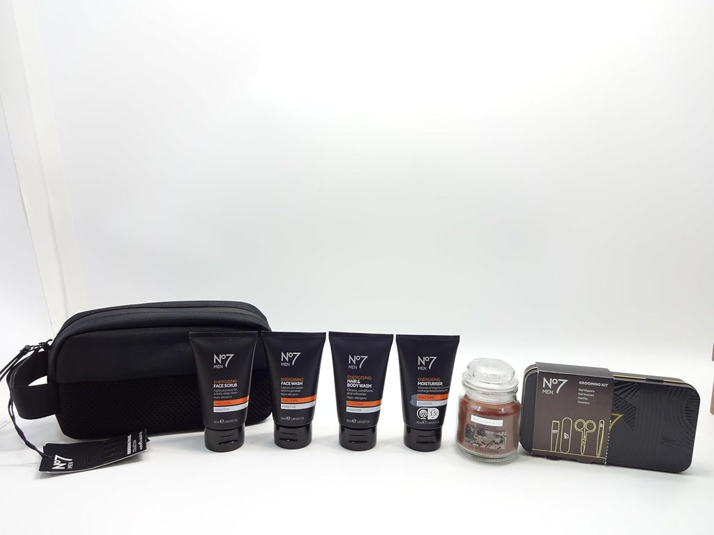 No7 skincare essentials with grooming kit, scented candle, and toiletry bag arranged neatly