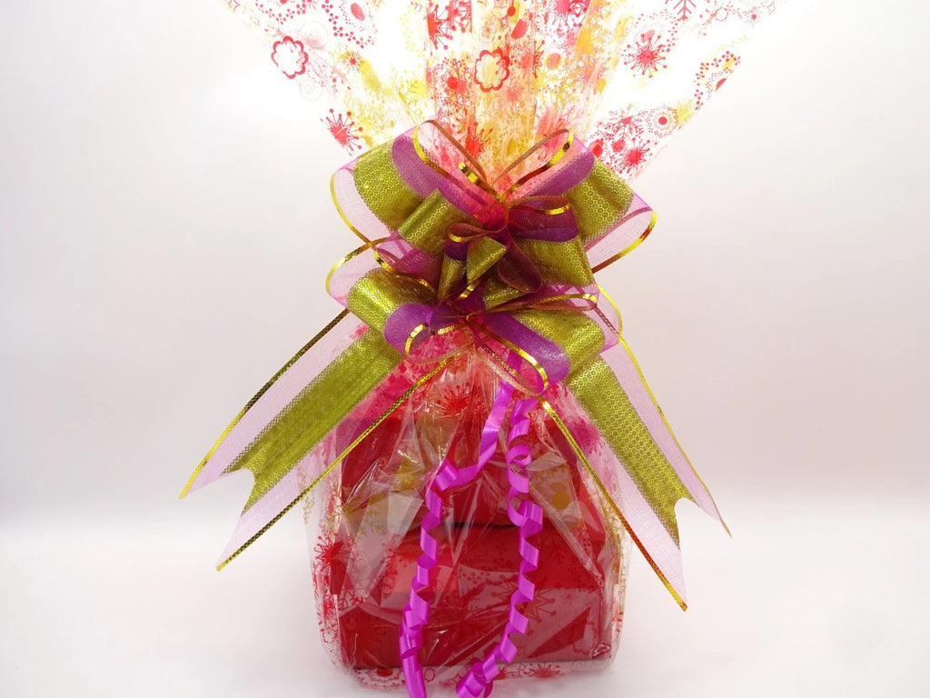 Decorative gift with colorful ribbons and a white background