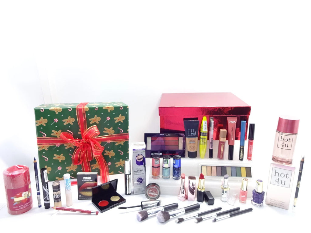 Assorted makeup products and gift boxes on a white background