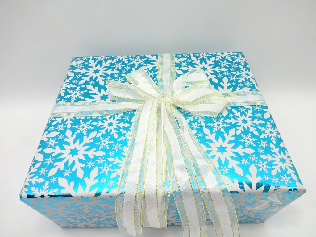 Blue snowflake design gift box with white ribbon for Maybelline 26pc Blockbuster Beauty Gift Set