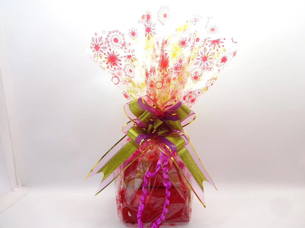 Decorative bouquet with colorful ribbons and flowers on a white background