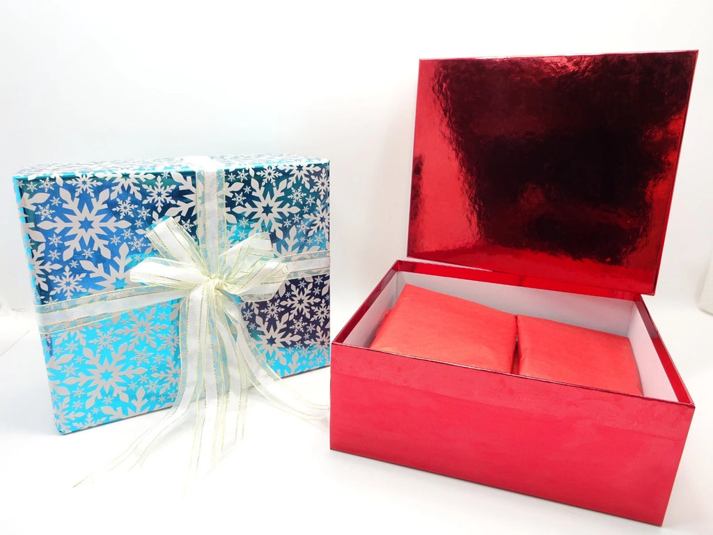 Open box view of Maybelline blockbuster makeup set with protective wrapping inside