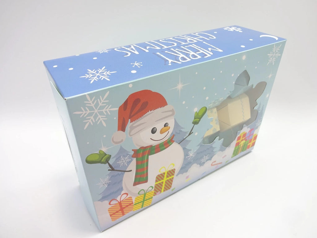 Side view of Maybelline Christmas cracker gift box with snowman and presents design