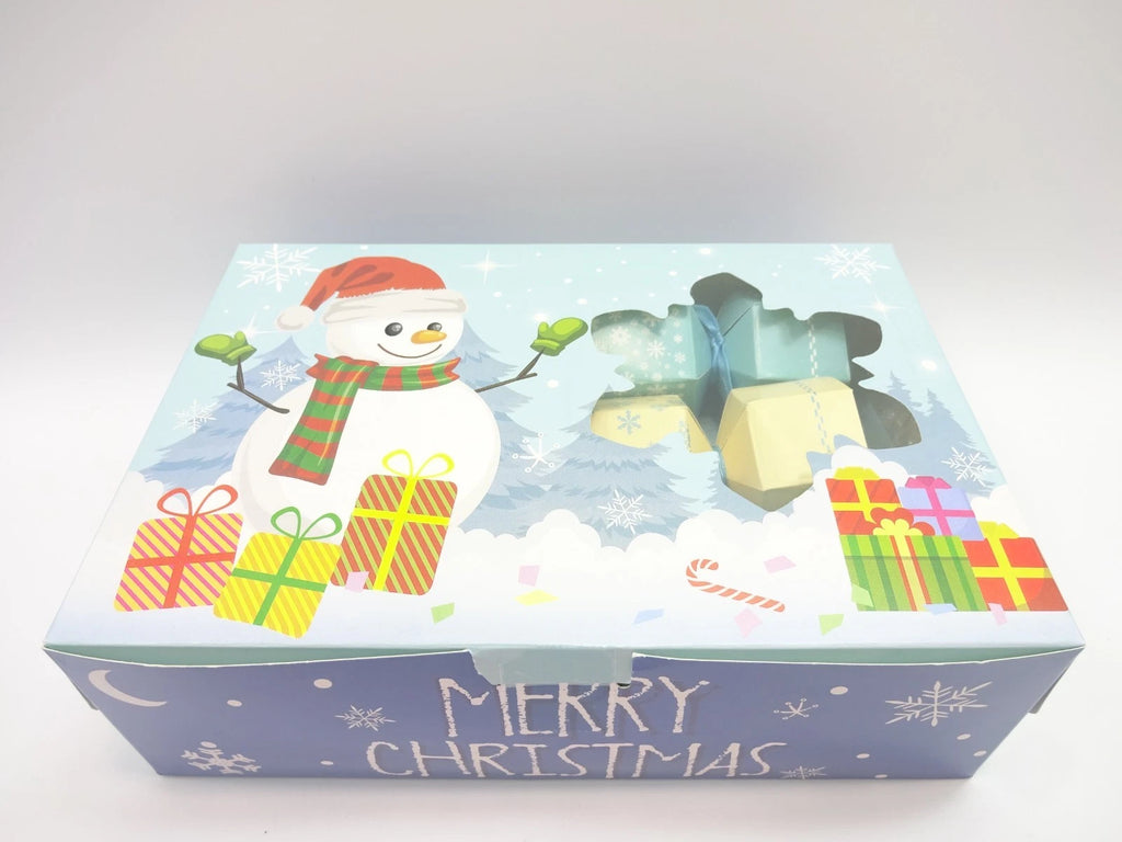 Close-up of Maybelline festive gift box featuring snowman with gifts and snowflake window