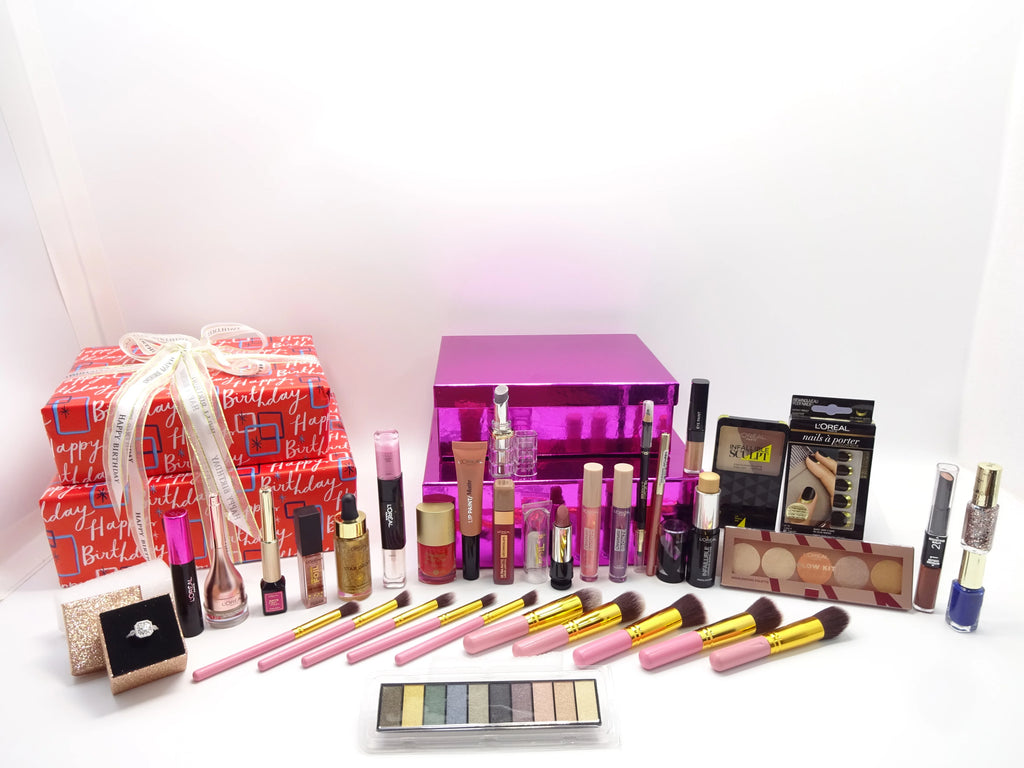 Red birthday gift wrapped loreal beauty box all makeup displayed outside the boxes