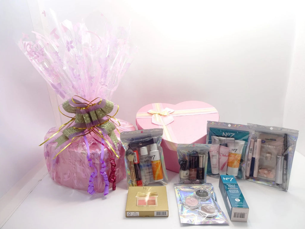 No7 and 17 luxury beauty box gift hamper wrapped in cellophane with gold and purple bow for women