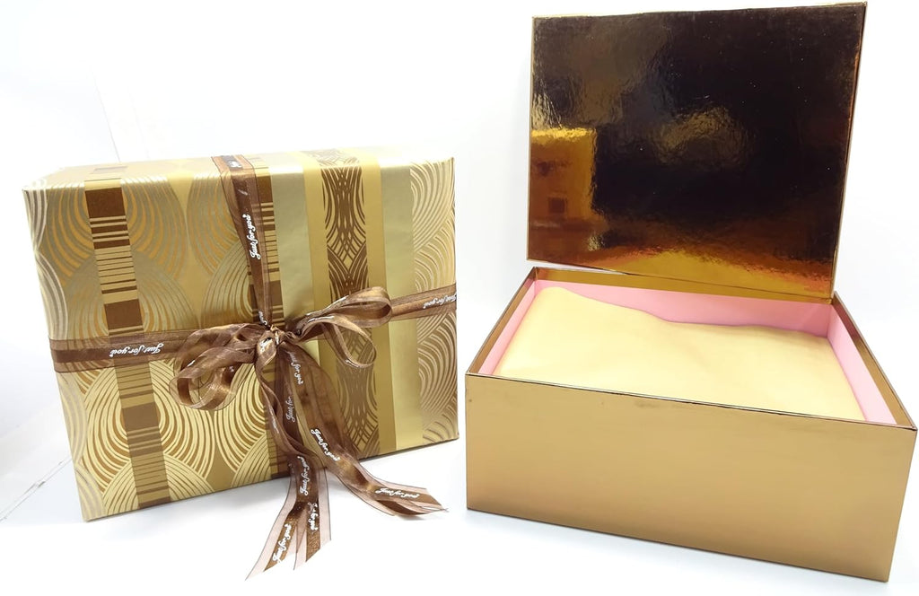 Open gold luxury gift box with soft yellow tissue lining beside Father's Day wrapped box