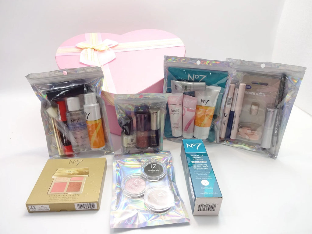 No7 and 17 skincare and makeup gift items arranged beside heart-shaped pink box