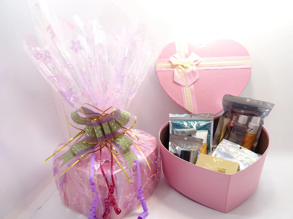Assorted No7 and 17 beauty products packaged neatly in holographic pouches beside gift box