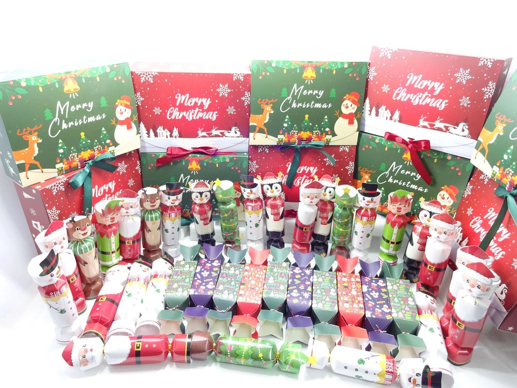 Collection of Christmas-themed products including nutcrackers, gift boxes, and crackers on a white background.