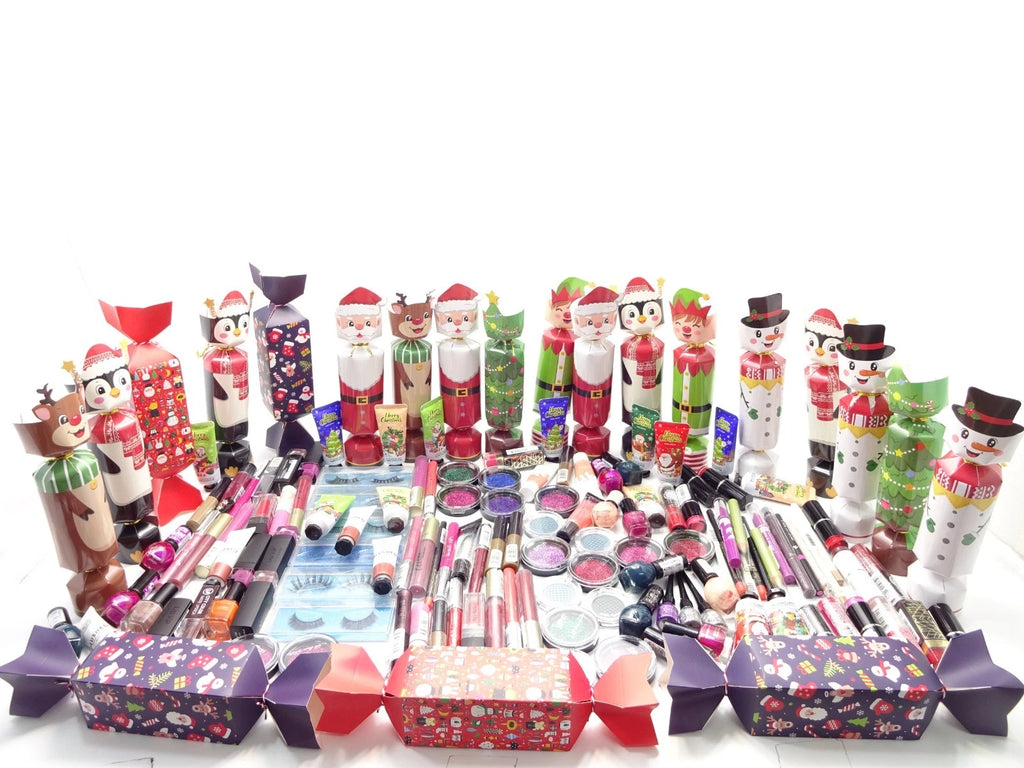 Assorted makeup products and decorative items on a white background