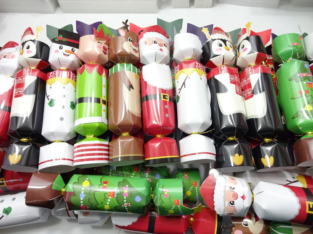 Rear view of Christmas cracker boxes showing festive icons and ribbon closures