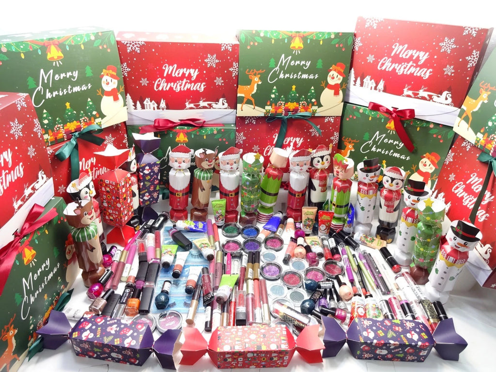 Assorted Christmas gift crackers and Merry Christmas boxes filled with makeup and cosmetic products