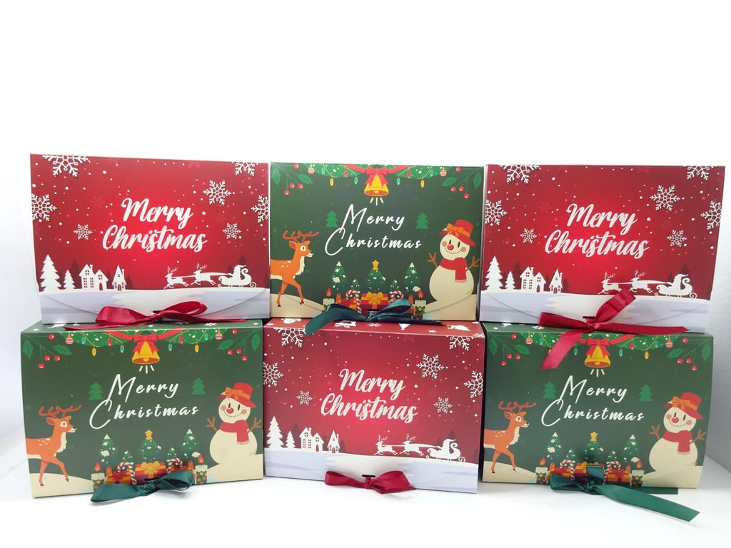 Christmas themed boxes and makeup crackers arranged together with beauty and cosmetic products