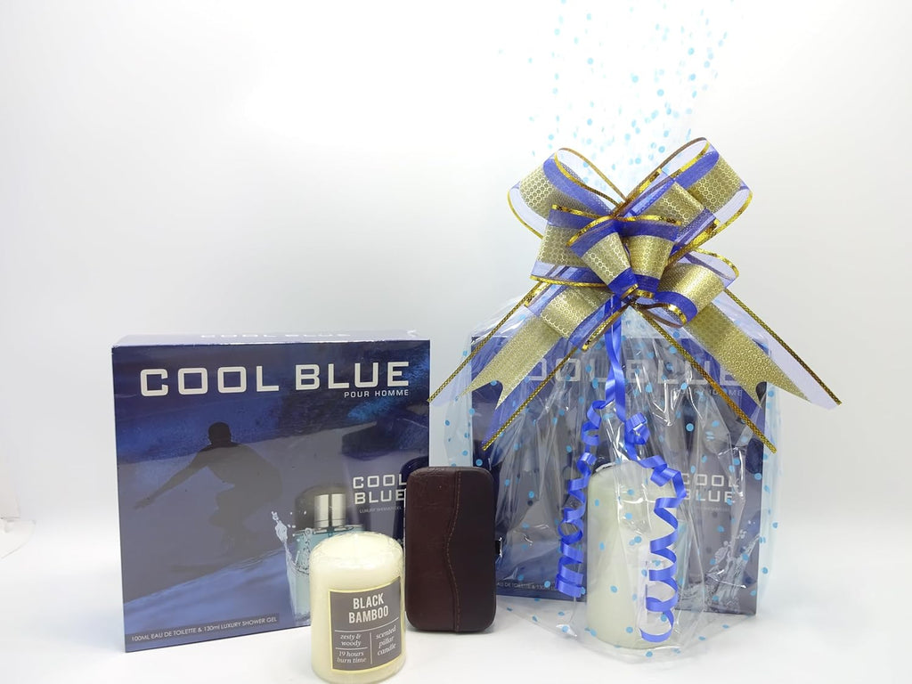 Open display of Cool Blue gift set including a scented candle, manicure tools, and Cool Blue perfume with shower gel.