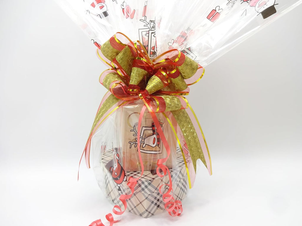 Beautifully wrapped GEM For Her Perfume and Makeup Kit Gift Hamper with decorative gold and red ribbon, perfect for gifting.