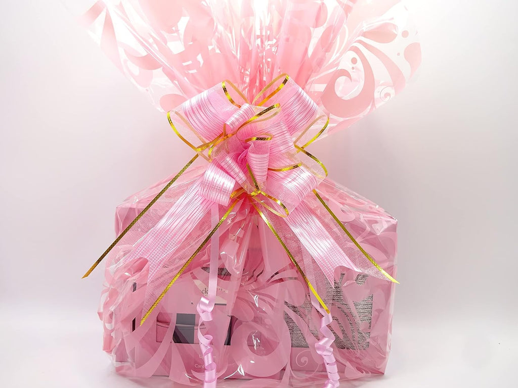 Jack Wills hamper wrapped in pink gift wrap with gold detailing and ribbon