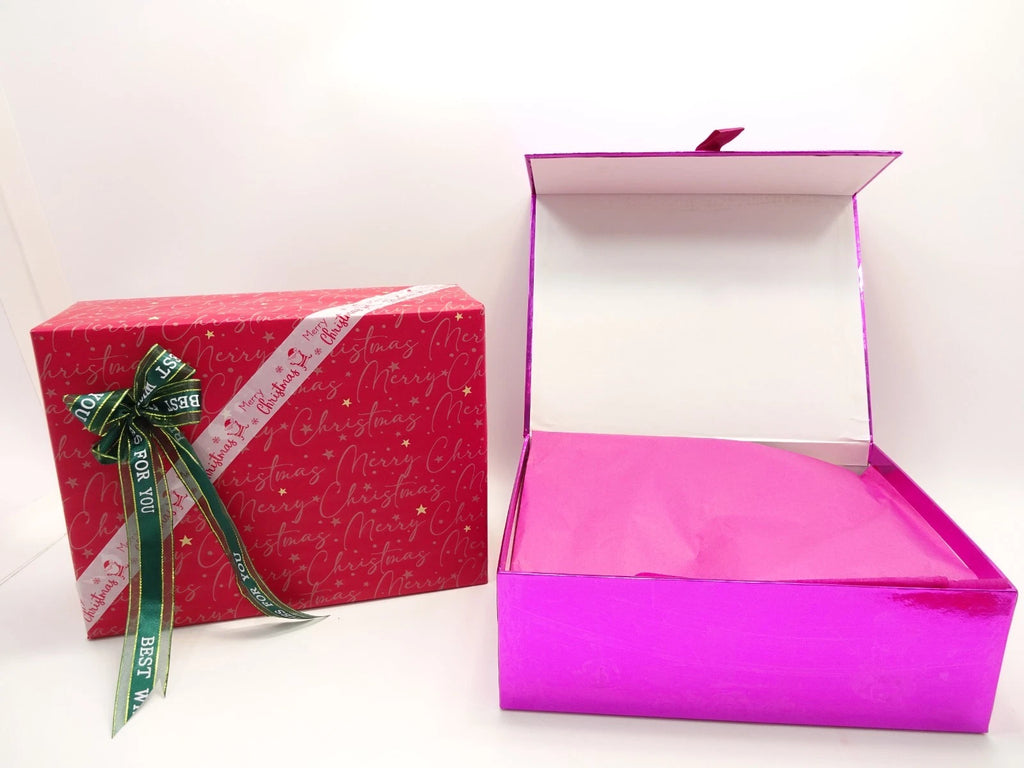 Open L’Oreal Christmas gift boxes showing tissue wrapping inside