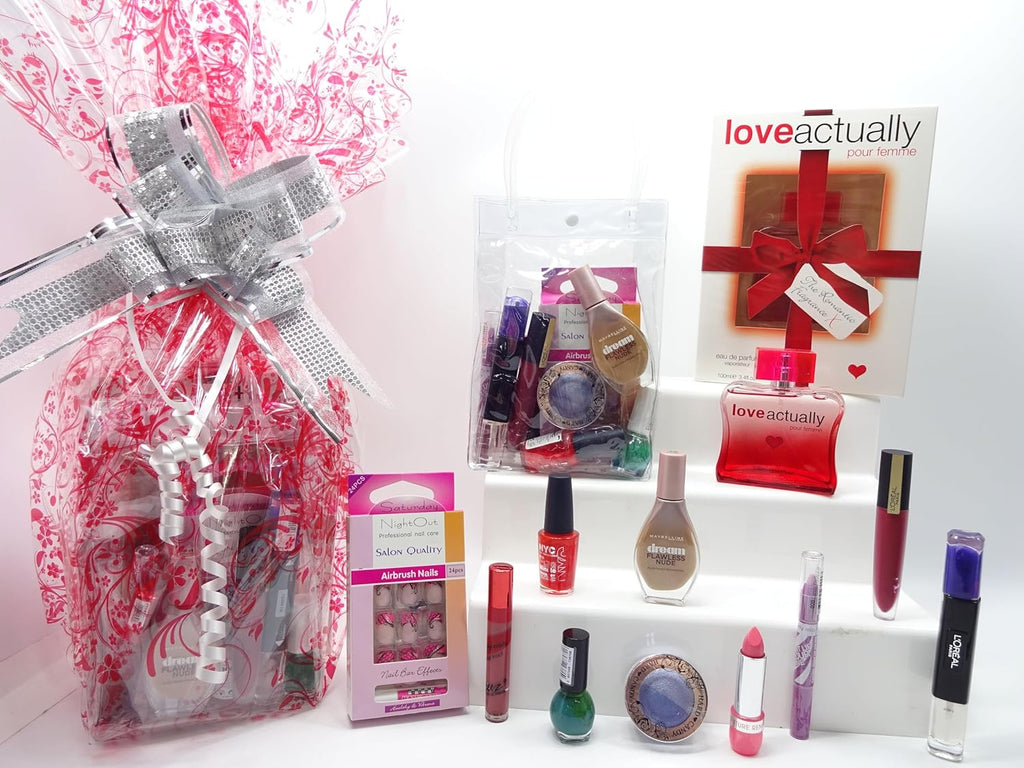 Full view of Love Actually Perfume gift hamper and beauty set contents, featuring a variety of makeup and nails