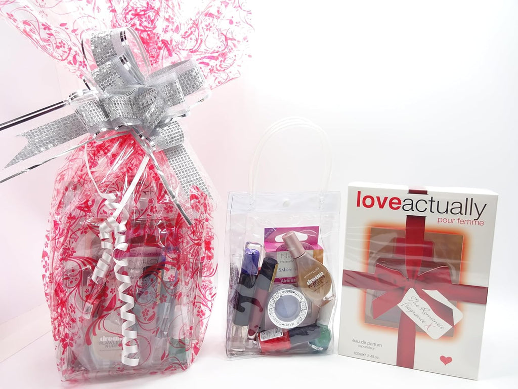 Love Actually perfume set with makeup kit and wrapped hamper on display