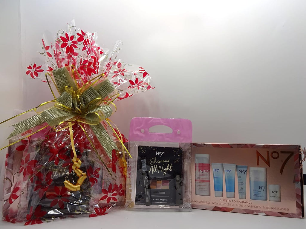 Side view of Luxury No7 Gift Hamper with skincare and makeup products in festive red wrapping.