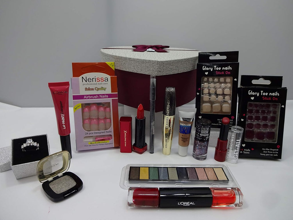 Close-up view of makeup products and accessories included in the MIX BRANDS 14pc Beauty Bundle, featuring various lipsticks, eyeshadows, and nail items.