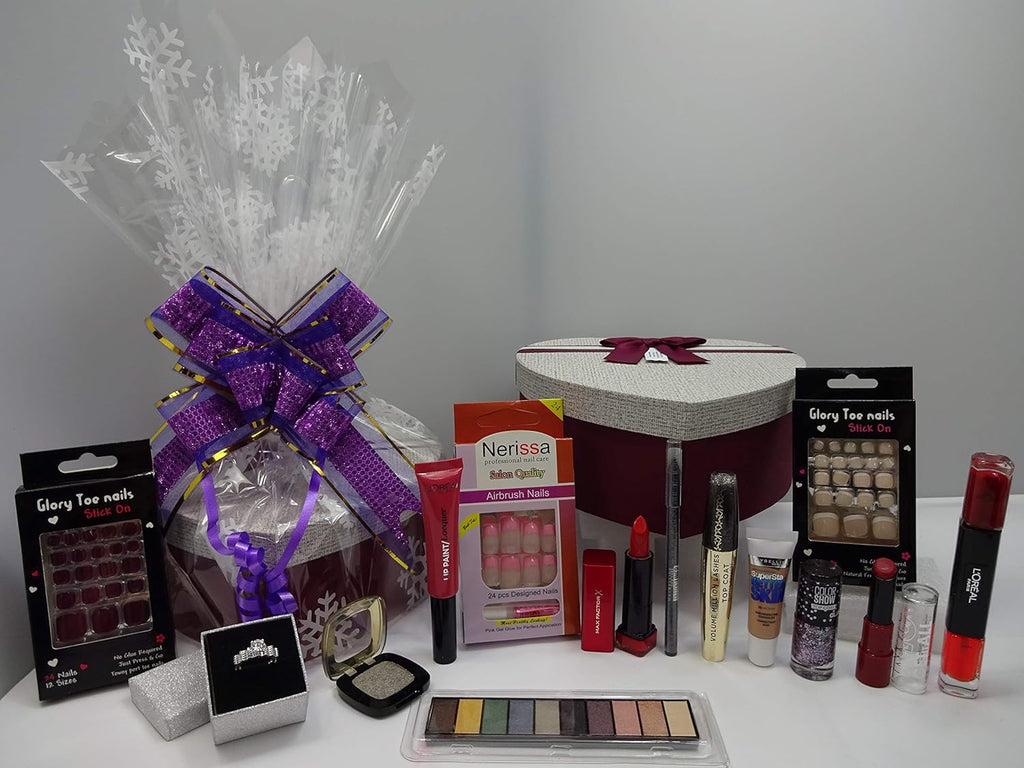 Front display of MIX BRANDS 14pc Beauty Bundle showing makeup items, nail accessories, and a free ring in a heart-shaped gift box with a purple ribbon.