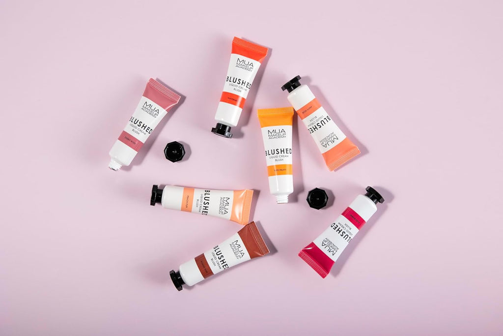 Assorted tubes of MUA Blushed Liquid Cream Blush in multiple shades including Watermelon, displayed on pastel background