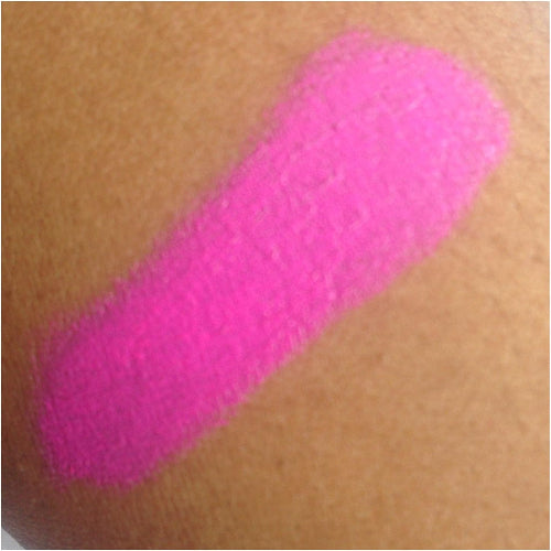 Swatch of MUA Lipstick Persian Rose showing bold bright pink shade on skin