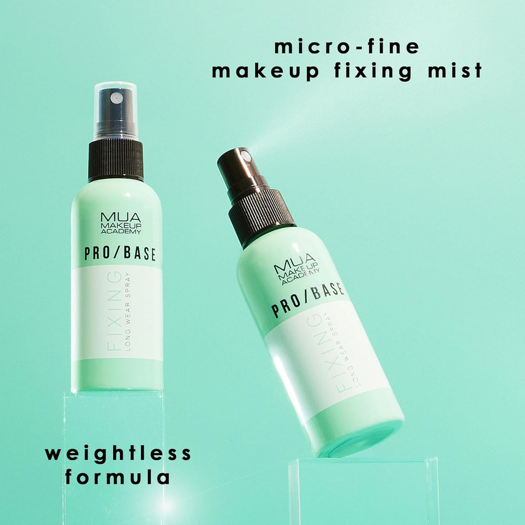 Close-up display of MUA Pro/Base Fixing Spray bottles with text showing “micro-fine mist” and “weightless formula”