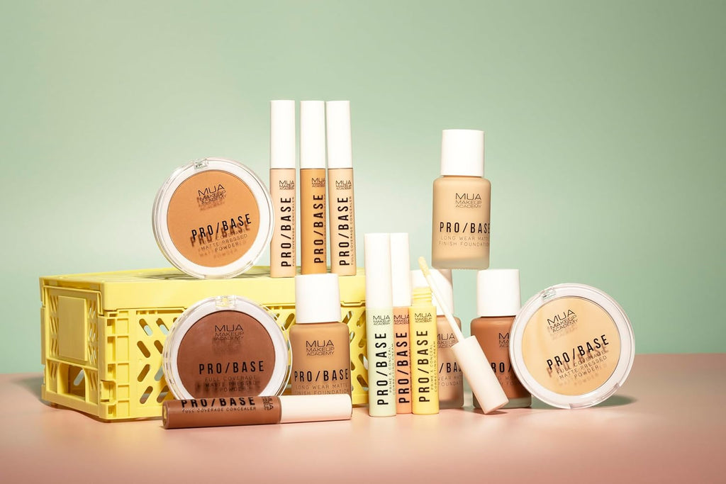 MUA Pro/Base collection display with foundations, powders, and concealers in various shades