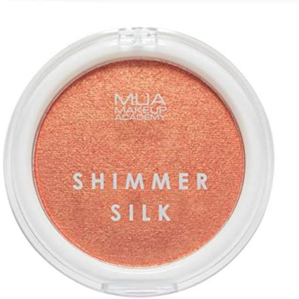 MUA Shimmer Silk Highlight Powder (Bright Spark) - closed compact showing shimmering orange powder