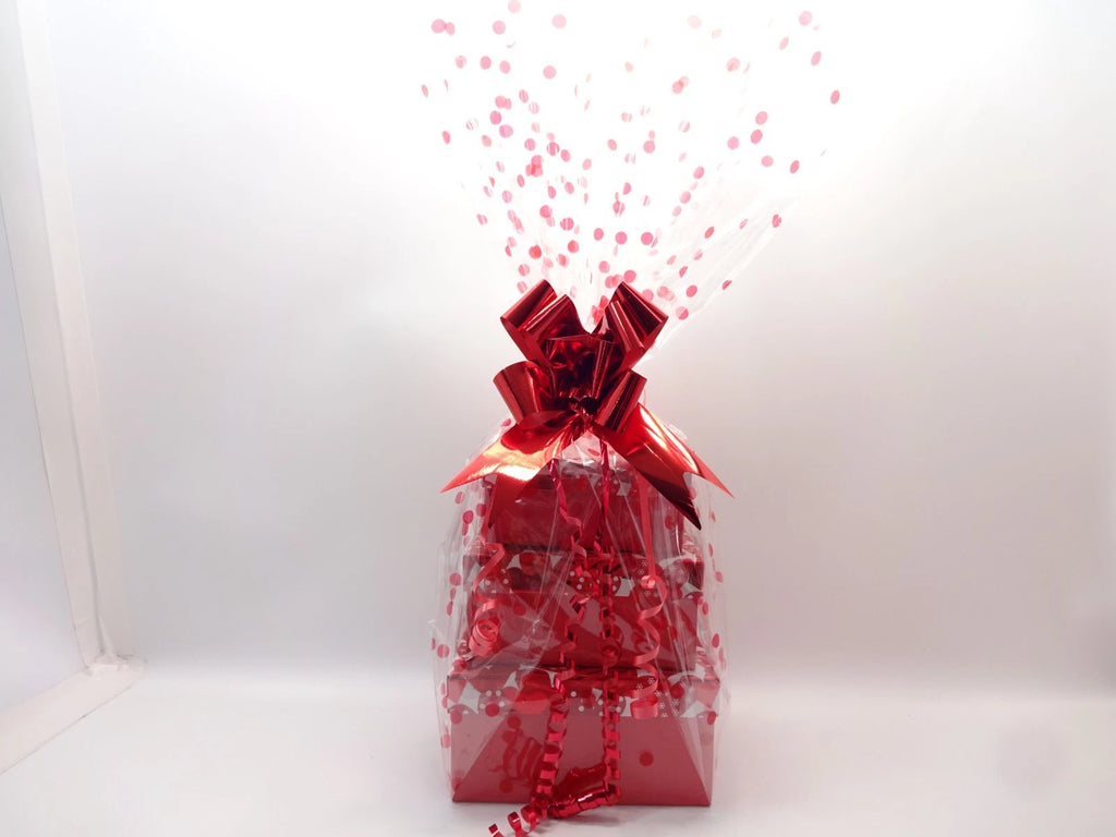 Complete Max Factor 3-tier beauty hamper display showing products and wrapped presentation