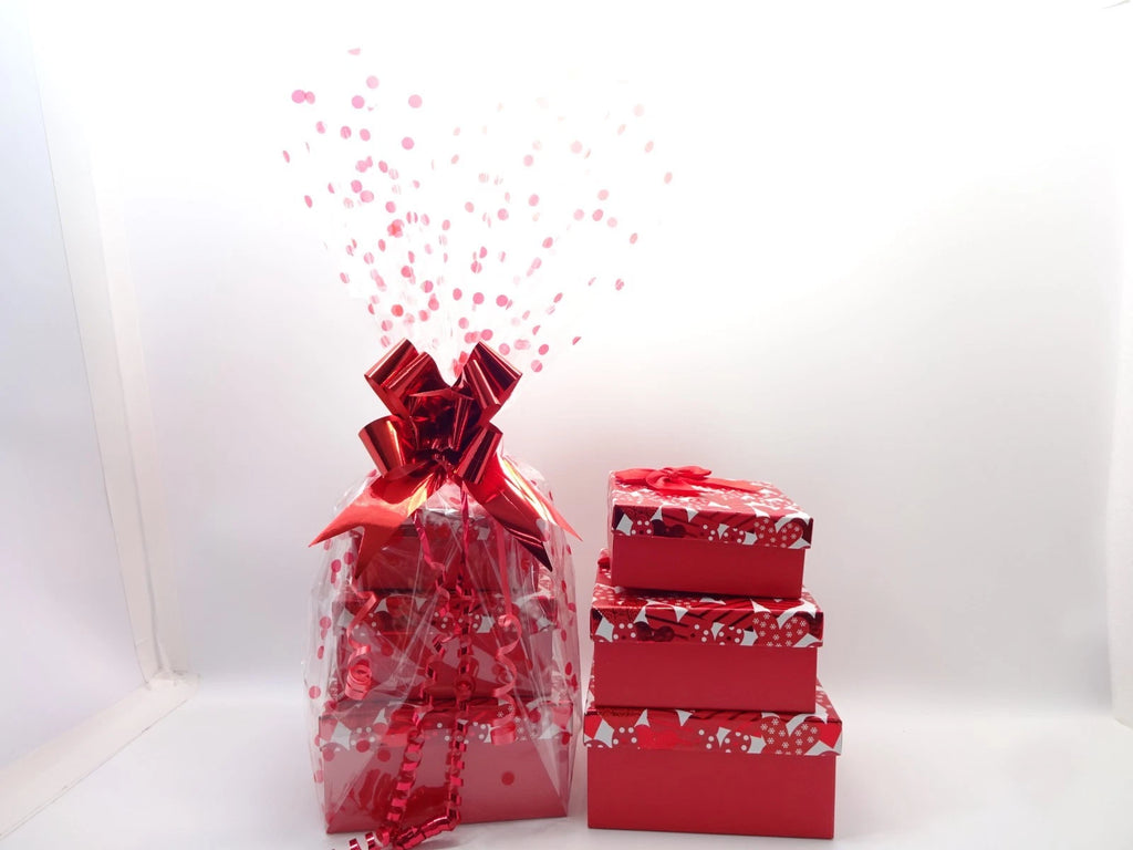 Flatlay of Max Factor lipsticks, mascara, palette, and beauty items beside makeup bag and nail polishes