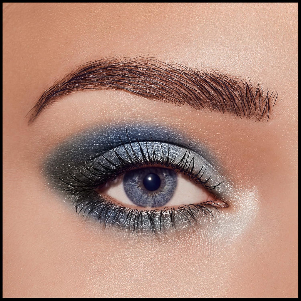 Model eye look featuring Max Factor Azure Allure palette with bold metallic blue and silver shimmer