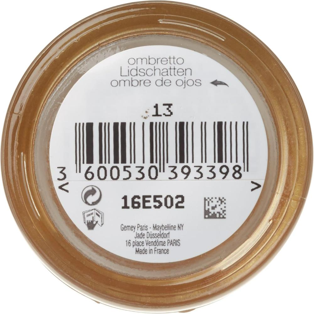 Maybelline Dream Mousse Eye Color 13 Divine Gold, bottom of the pot showing product details and barcode.