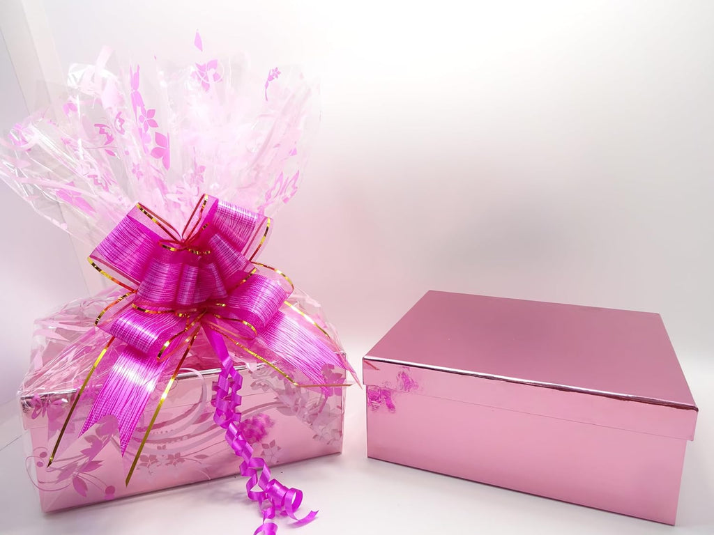 Maybelline 22pc luxury gift box wrapped in pastel pink with shimmering star design and elegant "Best Wishes For You" ribbon.