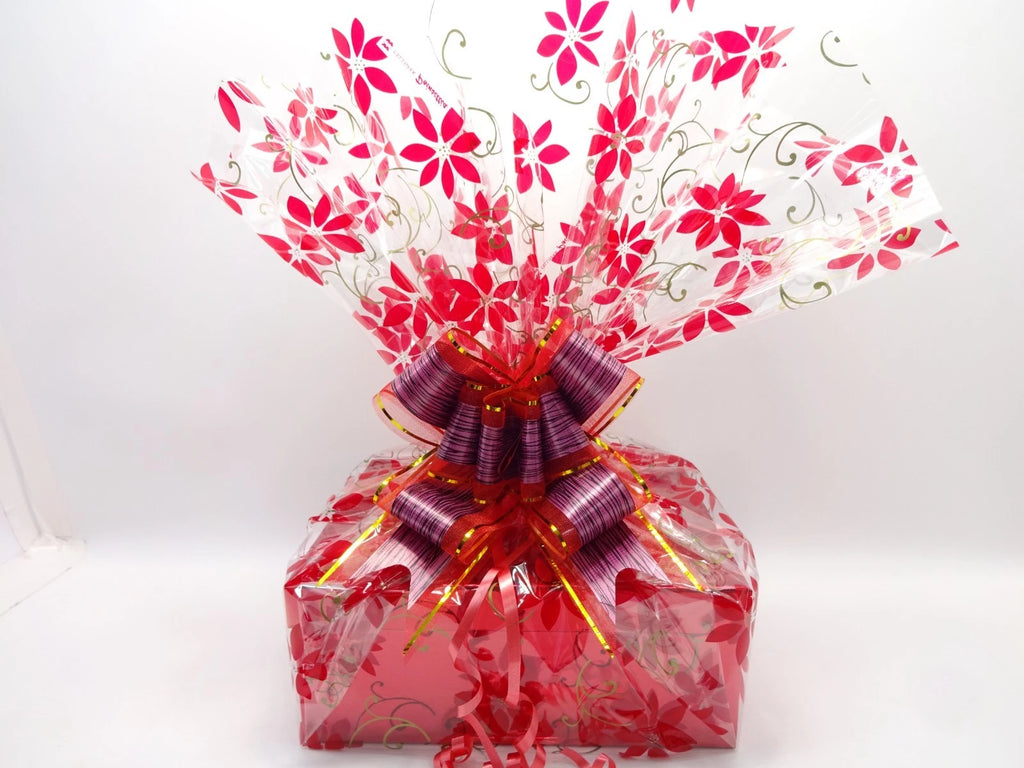 Angled view of Maybelline 26pc Makeup Gift Hamper in red luxury packaging
