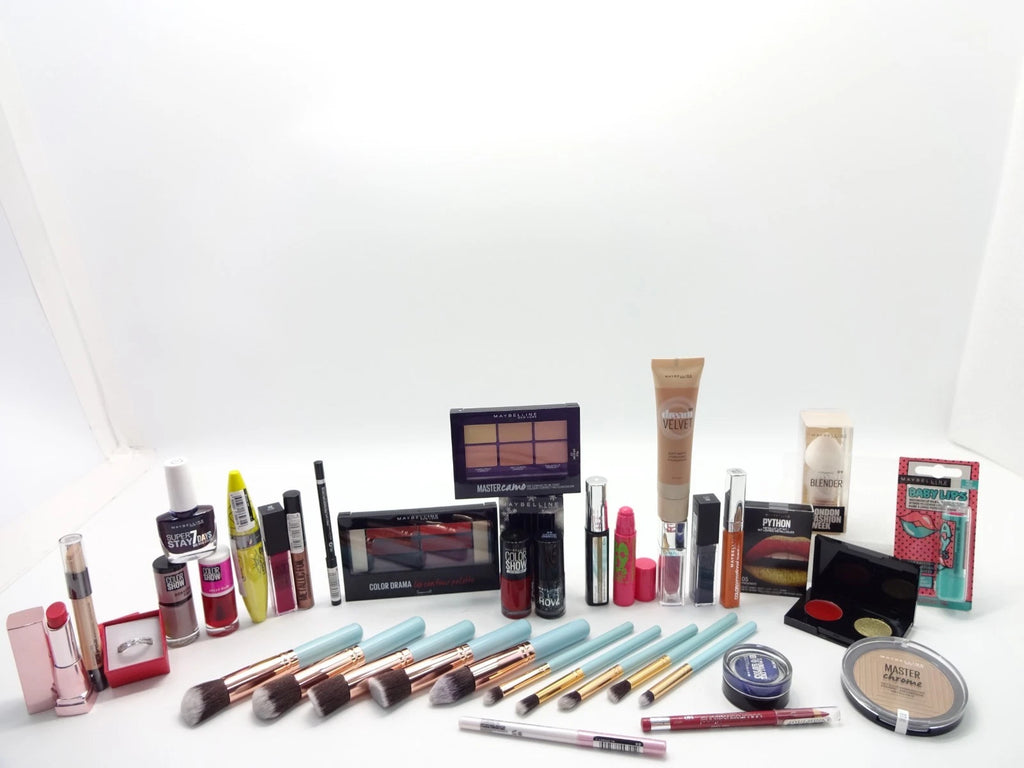 Open box view of Maybelline 26pc Makeup Gift Hamper with professionally wrapped cosmetics and beauty items