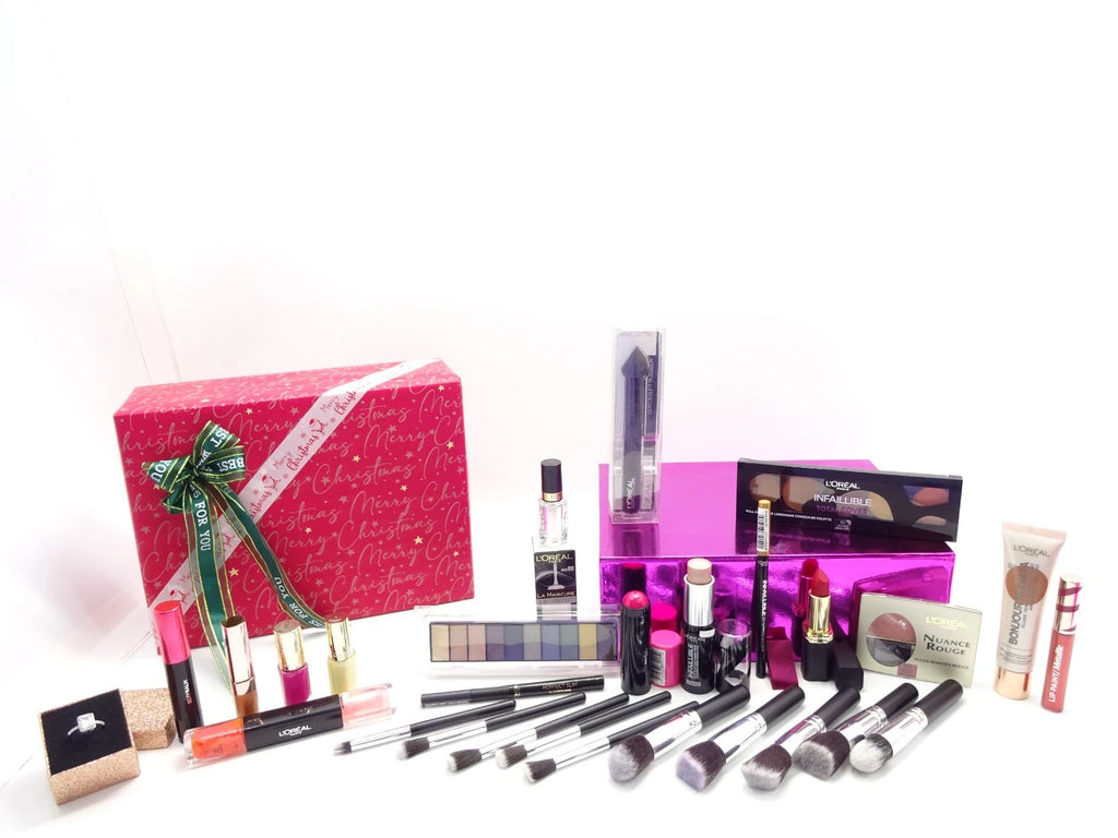 L’Oreal 17 piece makeup gift set beautifully arranged beside a red and pink festive gift box