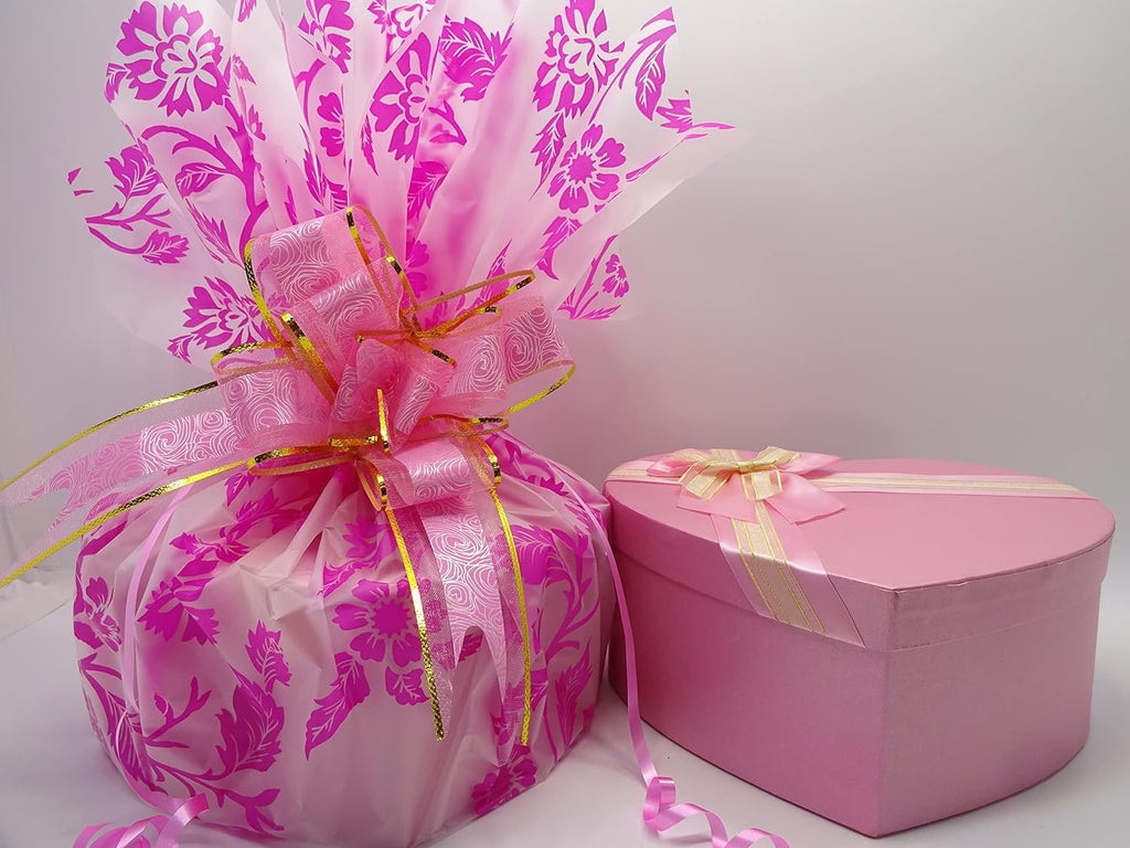 No7 Glamourous Collection Hamper wrapped in floral print gift wrap with pink and gold ribbon