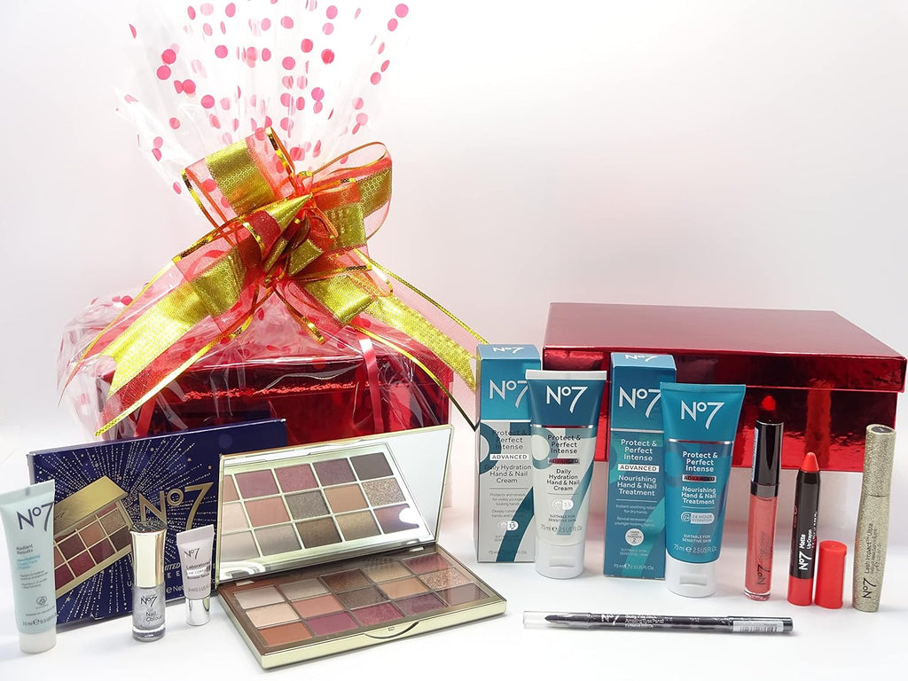 No7 Luxury Beauty Bundle Gift Set displayed with a wide range of No7 skincare and makeup products, neatly arranged alongside the vibrant gift-wrapped hamper.