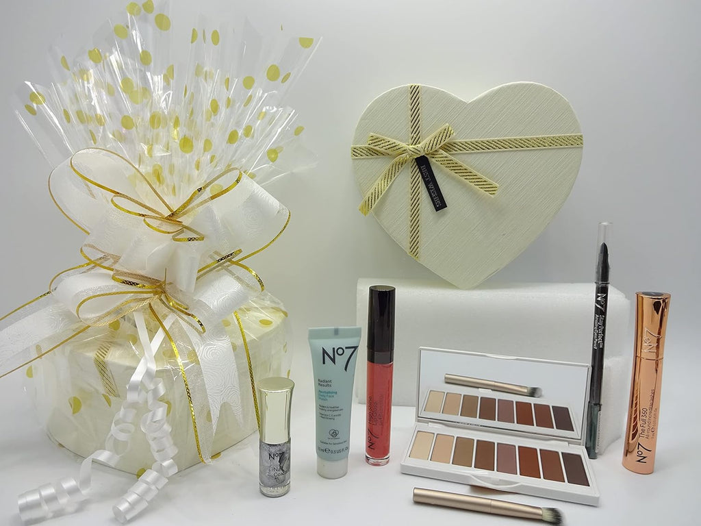 No7 Shimmer & Glow Collection items displayed with eye-catching white and gold heart-shaped gift box and luxurious makeup set.