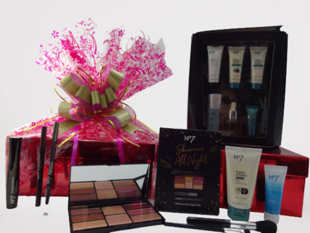 No7 Skincare and Beauty Collection hamper with pink bow and decorative floral wrap