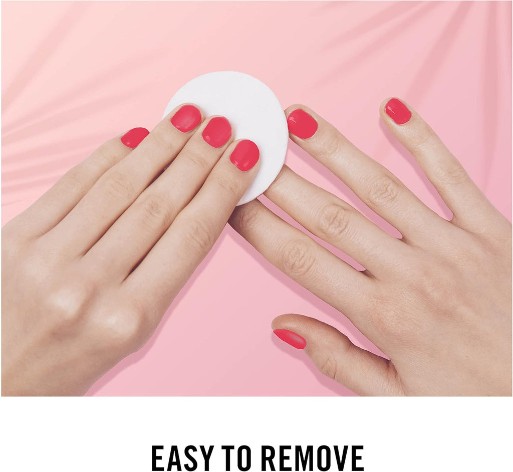 Hands removing Rimmel 60 Seconds Super Shine Nail Polish Coralicious with cotton pad