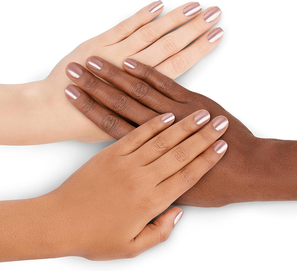 Rimmel 723 Sea Nymph nail polish applied on hands – elegant muted pink everyday wear shade